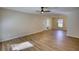 Spacious living room with hard wood flooring and neutral paint, ready for personal touches at 61 Andrew Rd, Covington, GA 30016