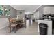 Dining room with a round table, wall art, and easy access to the kitchen at 5099 Leeshire Trce, Tucker, GA 30084