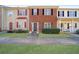 Charming townhouse exterior with brick facade and well-maintained landscaping at 5099 Leeshire Trce, Tucker, GA 30084