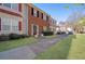 Townhouse exterior with brick and landscaped front yard at 5099 Leeshire Trce, Tucker, GA 30084