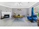 Inviting living room with neutral walls, fireplace, and an abundance of natural light at 5099 Leeshire Trce, Tucker, GA 30084