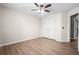The bedroom has wood floors, white walls, and a closet at 1208 Lauren Nw Ct, Acworth, GA 30101
