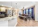 Bright kitchen with stainless steel appliances and lots of natural light from the nearby dining area at 1208 Lauren Nw Ct, Acworth, GA 30101
