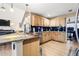 Open concept kitchen featuring a center island with granite countertop and stainless steel appliances at 1208 Lauren Nw Ct, Acworth, GA 30101