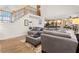 Open concept living room with high ceilings and a view of the kitchen and staircase at 1208 Lauren Nw Ct, Acworth, GA 30101