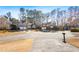A street view of the neighborhood showcasing the well-maintained homes and mature trees at 1208 Lauren Nw Ct, Acworth, GA 30101