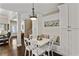 Charming breakfast nook with bench seating, bright lighting, and seamless transition to the main living space at 1605 Dr Bramblett Rd, Cumming, GA 30028