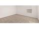 Bedroom featuring neutral carpet and natural light from the window at 1838 Lacebark Elm Way, Lawrenceville, GA 30045