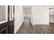 Inviting entryway with beautiful hardwood floors, neutral walls, and an open floor plan at 1838 Lacebark Elm Way, Lawrenceville, GA 30045