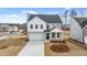 Charming two-story home with a two-car garage and manicured landscaping in a desirable neighborhood at 1838 Lacebark Elm Way, Lawrenceville, GA 30045