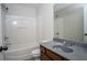 Bathroom featuring a tub-shower combo, toilet, and vanity with granite countertop at 2715 Maple Park Pl # 30, Cumming, GA 30041