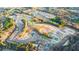 New construction community aerial view showcasing spacious lots and tree-lined streets at 1828 Lacebark Elm Way, Lawrenceville, GA 30045