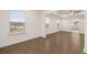 Spacious bedroom featuring hardwood floors and natural lighting at 1828 Lacebark Elm Way, Lawrenceville, GA 30045