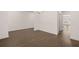 Dining room with hardwood floors and white trim, showcasing ample space and natural light at 1828 Lacebark Elm Way, Lawrenceville, GA 30045