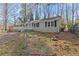 Spacious backyard showcasing the home's outdoor area, ideal for gardening and outdoor activities at 2790 Collier Nw Dr, Atlanta, GA 30318