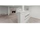Finished basement featuring carpeted floor, brick fireplace and half wall at 2790 Collier Nw Dr, Atlanta, GA 30318
