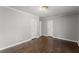 Spacious bedroom featuring hardwood floors, base molding and neutral wall paint at 2790 Collier Nw Dr, Atlanta, GA 30318