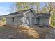 Exterior elevation showing the two-car garage with attached home with a covered porch at 2790 Collier Nw Dr, Atlanta, GA 30318