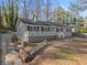 A quaint single-story home featuring a covered front porch and classic architectural design at 2790 Collier Nw Dr, Atlanta, GA 30318