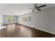 Spacious living room with hardwood floors, a fireplace, and natural lighting at 2790 Collier Nw Dr, Atlanta, GA 30318
