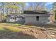 Rear exterior shot of the house with large yard at 2790 Collier Nw Dr, Atlanta, GA 30318
