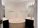 Bathroom featuring double sinks and a garden tub. Perfect for relaxation! at 3015 Camden Way, Alpharetta, GA 30005