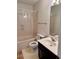 Bathroom with tub, shower, toilet, and vanity sink with mirror at 3015 Camden Way, Alpharetta, GA 30005