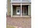 Covered patio area offering a shaded outdoor space at 3015 Camden Way, Alpharetta, GA 30005