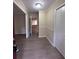 Spacious foyer with updated flooring and neutral wall paint at 4829 Woodhurst Way, Stone Mountain, GA 30088
