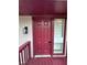 Inviting front door with sidelight window and traditional design at 4829 Woodhurst Way, Stone Mountain, GA 30088