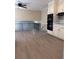 Open concept kitchen with adjacent dining area and sleek design at 4829 Woodhurst Way, Stone Mountain, GA 30088