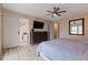 Comfortable bedroom with tv and access to Primary bathroom at 2590 Runic Way, Johns Creek, GA 30022
