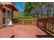 Beautiful deck featuring a stained wood railing and providing ample space for outdoor activities at 1231 Wildcliff Cir, Atlanta, GA 30329