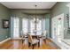 Cozy dining room with hardwood floors and plenty of natural light at 1231 Wildcliff Cir, Atlanta, GA 30329