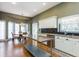 Bright kitchen featuring stainless steel appliances, granite countertops, and a dining area at 1231 Wildcliff Cir, Atlanta, GA 30329