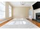 Bright living room featuring hardwood floors, fireplace, and natural light at 1231 Wildcliff Cir, Atlanta, GA 30329