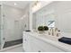 Modern bathroom showcasing a double vanity, glass-enclosed shower, and sleek fixtures at 240 Mount Zion Rd, Hapeville, GA 30354