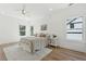 Bright bedroom with hardwood floors, light walls, a ceiling fan, and large windows at 240 Mount Zion Rd, Hapeville, GA 30354