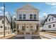 Charming two-story home with a welcoming front porch and inviting curb appeal at 240 Mount Zion Rd, Hapeville, GA 30354