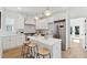 Bright kitchen features a large island, stainless steel appliances, and modern white cabinetry at 240 Mount Zion Rd, Hapeville, GA 30354