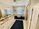 A spacious bathroom with dual sinks, lots of counter space, and a cozy sitting area at 3817 Bay Orchard Ln, Loganville, GA 30052