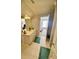 Bathroom featuring double sinks, tile floor and view to a bedroom at 3817 Bay Orchard Ln, Loganville, GA 30052