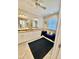 A spacious bathroom with dual sinks, lots of counter space, and a cozy sitting area at 3817 Bay Orchard Ln, Loganville, GA 30052