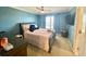 Bedroom featuring a bed, tv and nice furnishings at 3817 Bay Orchard Ln, Loganville, GA 30052