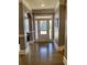 Spacious front foyer with a view into a large living room at 3817 Bay Orchard Ln, Loganville, GA 30052