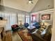 Cozy living room with vaulted ceilings, hardwood floors, and ample seating at 3817 Bay Orchard Ln, Loganville, GA 30052