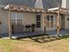 Backyard with a covered patio, grill and grassy area at 510 Pittman Mill Ct, Loganville, GA 30052
