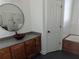 Bathroom featuring a vessel sink, a modern shower, and a tub at 510 Pittman Mill Ct, Loganville, GA 30052
