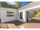 Charming back porch area with a ceiling fan and views of the backyard and neighborhood at 1464 Ezra Church Nw Dr, Atlanta, GA 30314