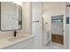 This bathroom showcases a double vanity with modern fixtures and a bright, clean design at 1464 Ezra Church Nw Dr, Atlanta, GA 30314